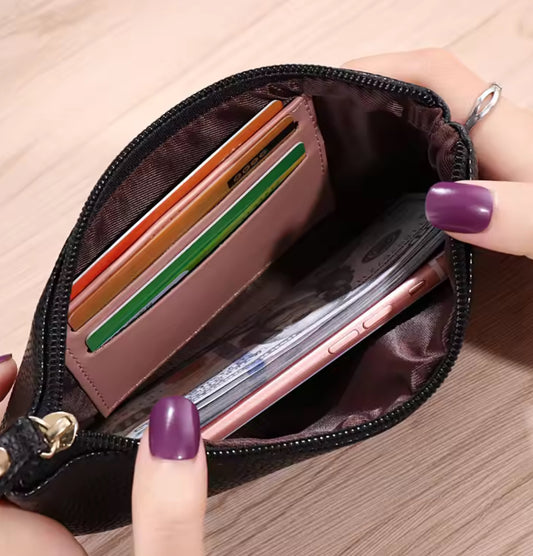 👜 Pochette Multi-fonctions avec Dragonne – Élégance & Praticité